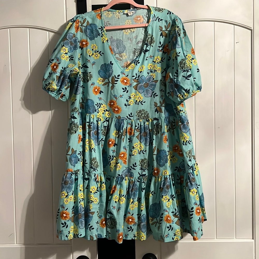 Worn once.  Super fun and comfortable dress.  Cleaning out my closet.